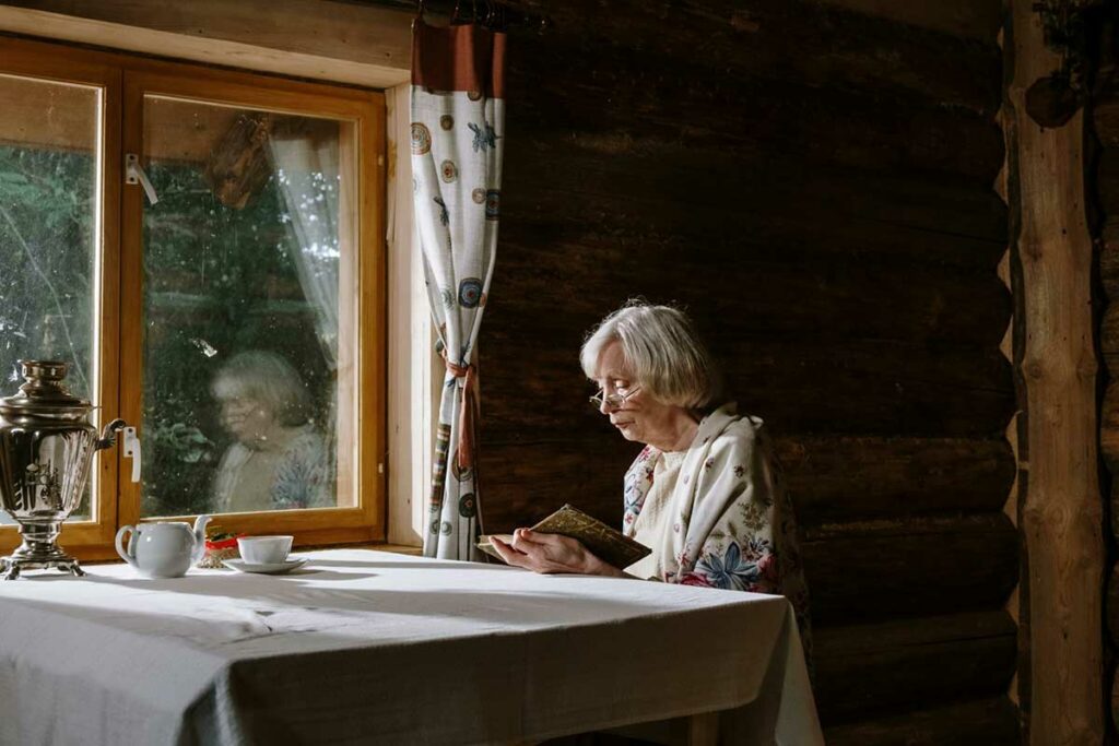 elderly woman reading